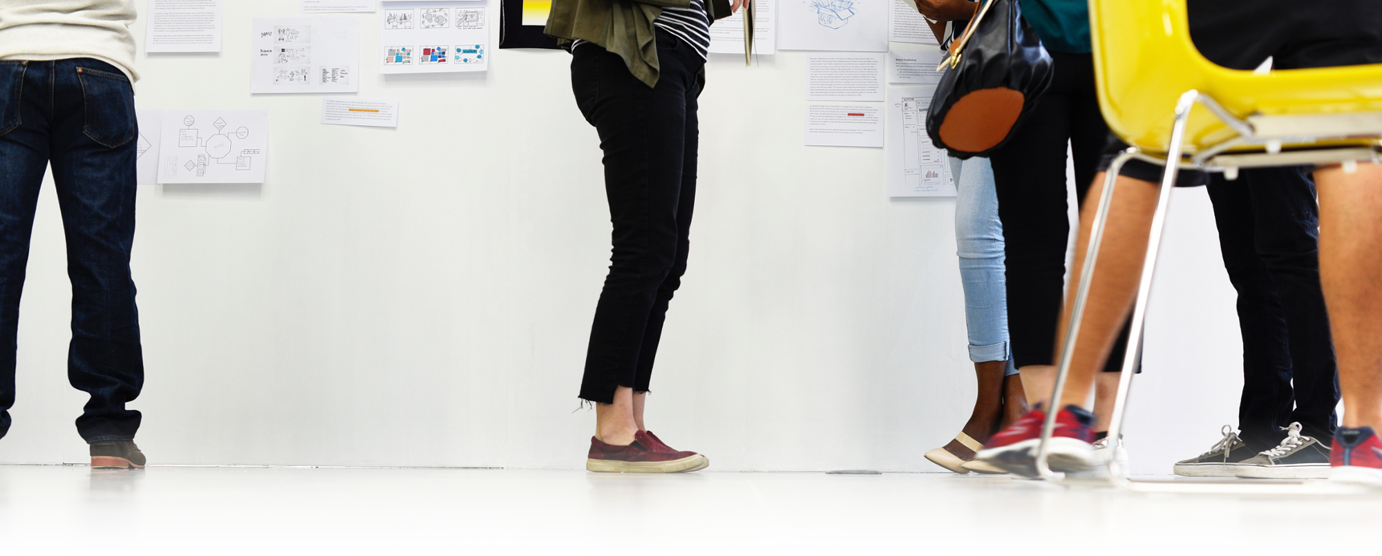 Students standing in front of whiteboard