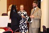 Drs. Rebecca Lee and Charles Layne talking with Drs. Wendy Johnson-Askew (blue suit) and Olivia Thompson (pink sweater)