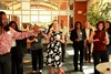 Raul Orland Edward instructing conference attendees on some salsa steps