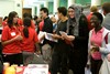 Audience members check out the posters