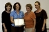 Ms. Laura Moore (left), Dr. Bode and Dr. Lee with Renée Barron, who won the outstanding undergraduate student award in Nutrition 