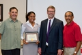 (from left) Dr. Trevino, Dr. Layne, Toochukwu “Ify” Mbah (winning the award for Excellence in Sport Administration) and Dr. Pearson   