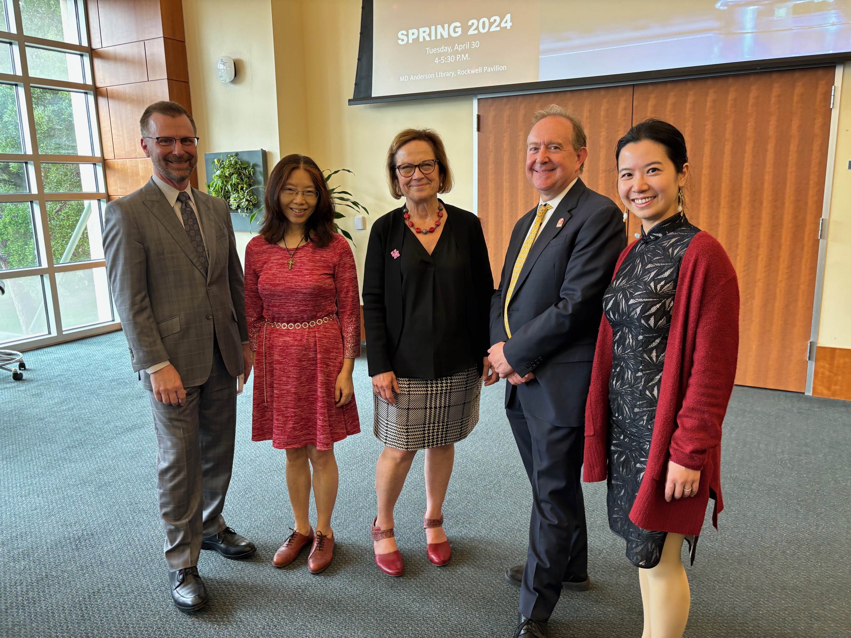 UH Faculty and Provost in small group photo