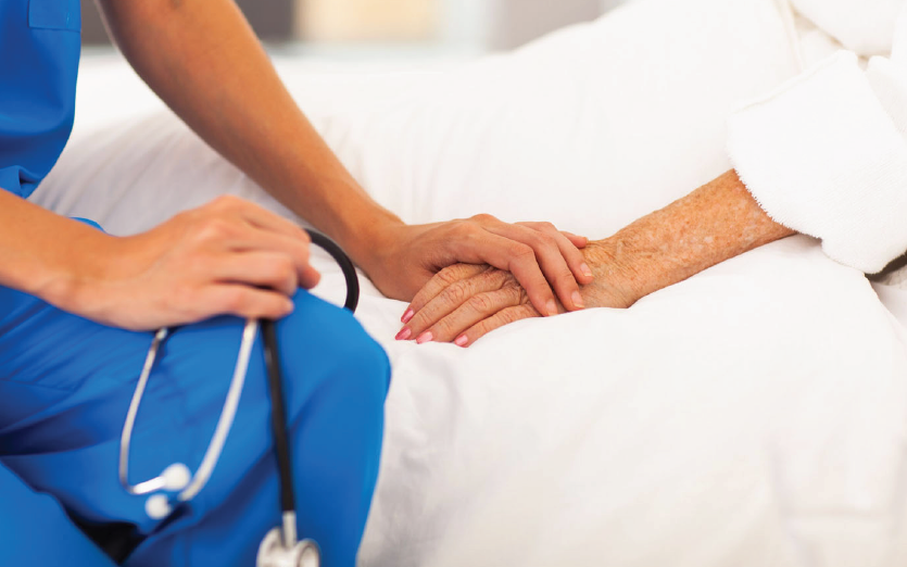 A Doctor Comforts a Patient