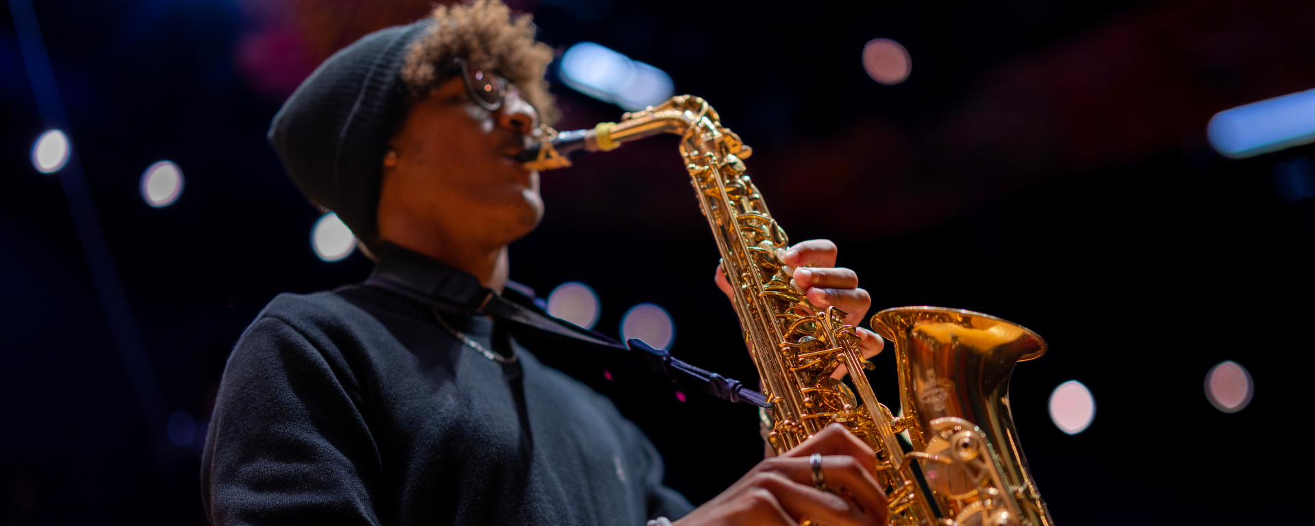 A saxophone player on the Moores Opera House stage