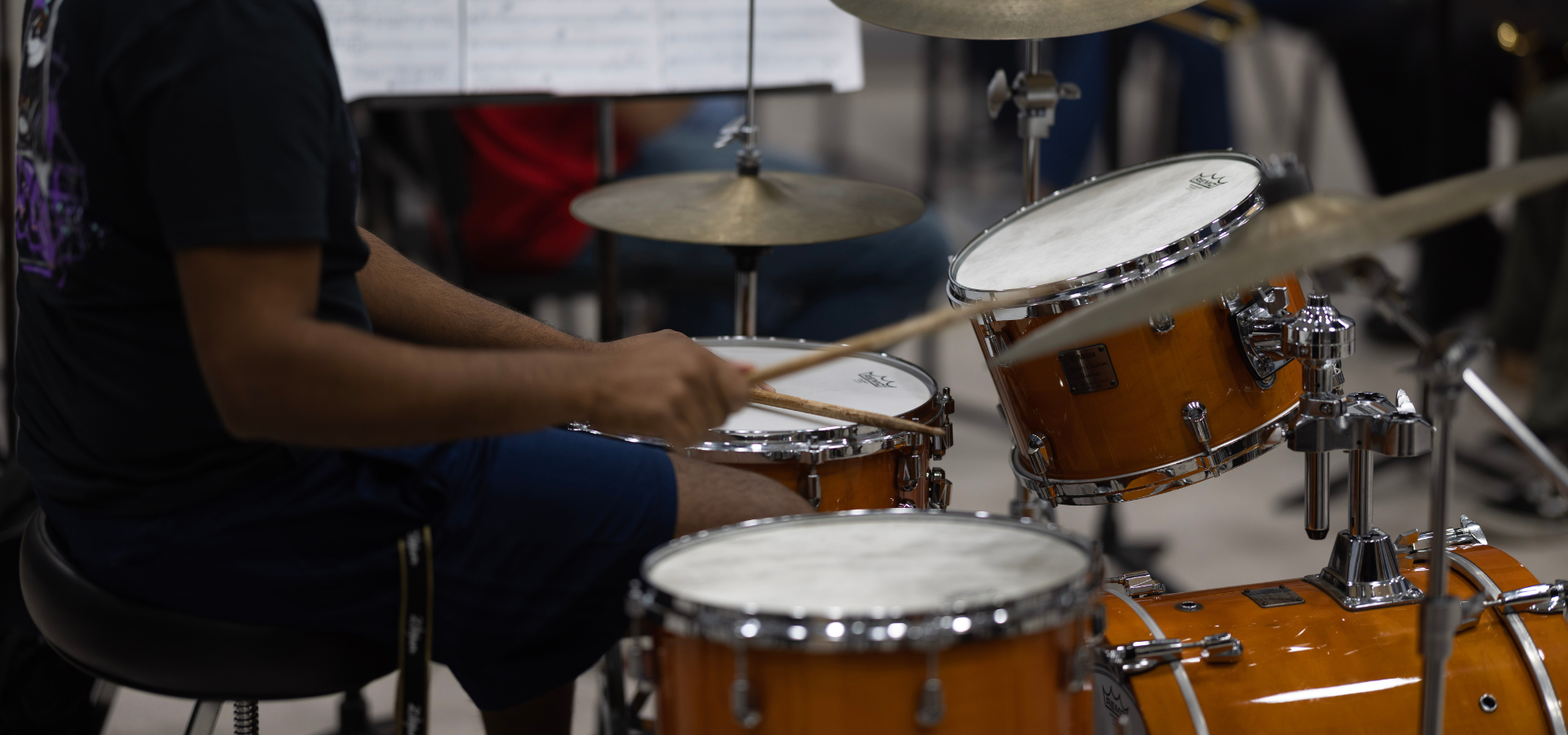 Drummer playing the drum set