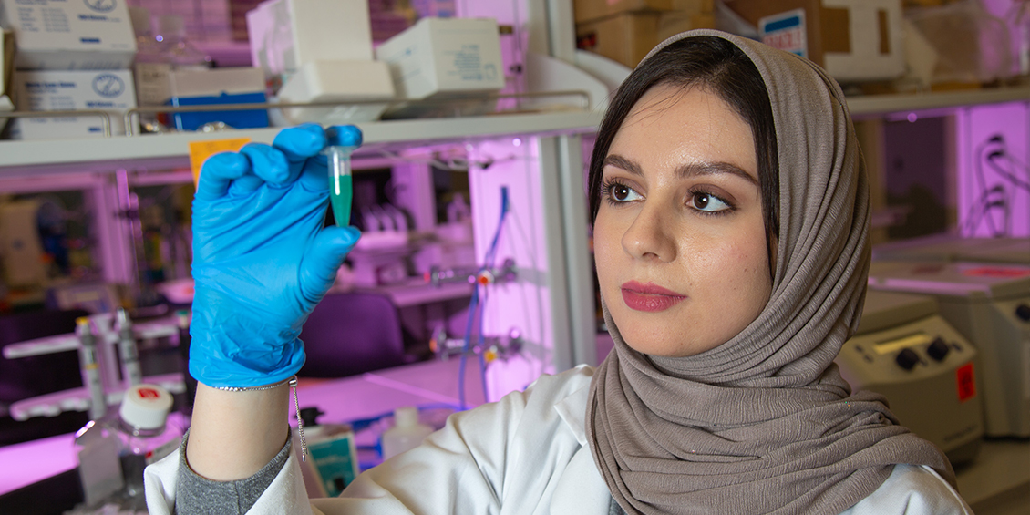 Photo of Ph.D. student in laboratory