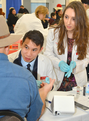 student perform cholesterol screening