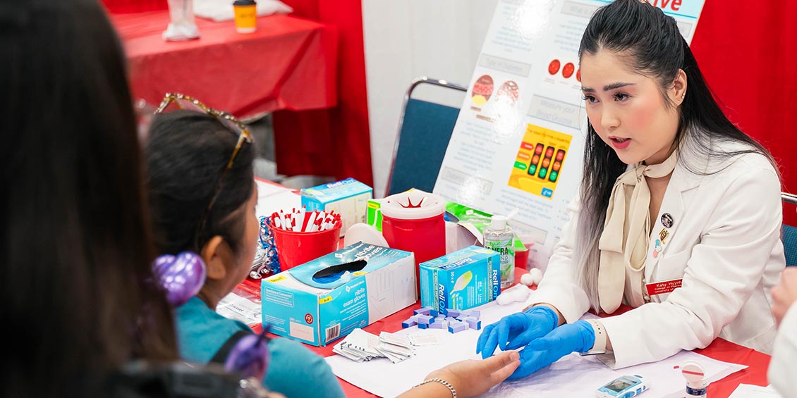 Photo of Pharm.D. student performing screening