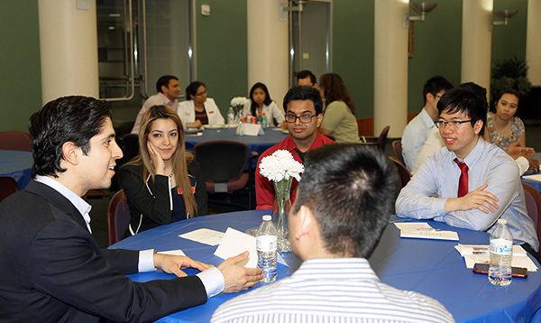 students and pharmacist talking