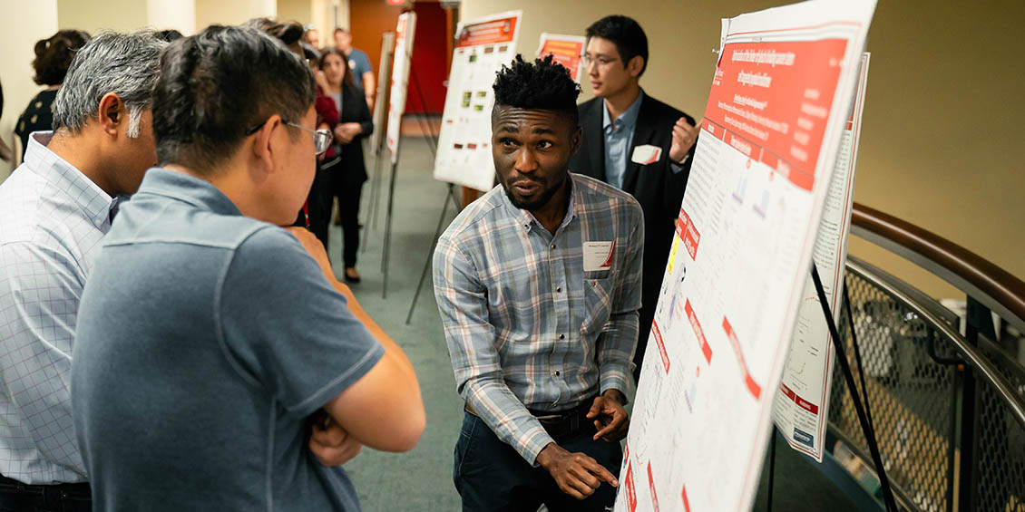 poster presenter and attendees