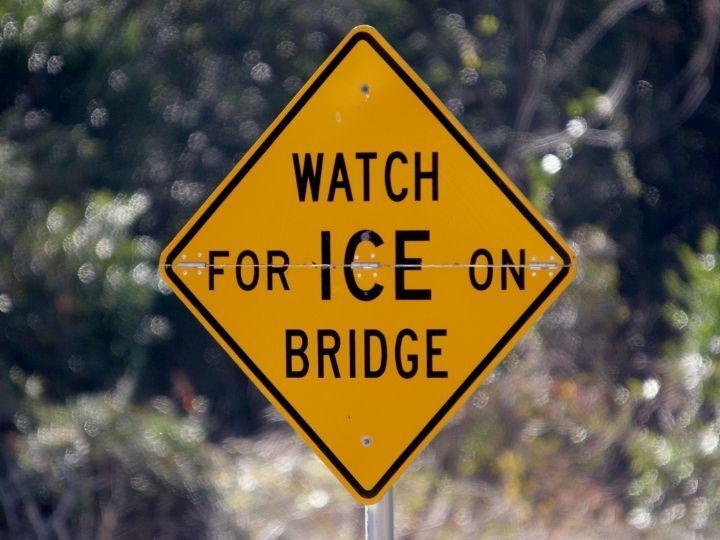 watch for ice road sign